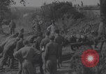Image of German prisoners digging graves Normandy Dompaire France, 1944, second 20 stock footage video 65675079421