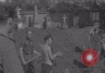Image of German prisoners digging graves Normandy Dompaire France, 1944, second 41 stock footage video 65675079421