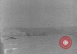 Image of soldiers on Omaha Beach WW2 Normandy France, 1944, second 1 stock footage video 65675079431