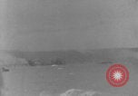 Image of soldiers on Omaha Beach WW2 Normandy France, 1944, second 4 stock footage video 65675079431