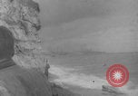 Image of soldiers on Omaha Beach WW2 Normandy France, 1944, second 5 stock footage video 65675079431