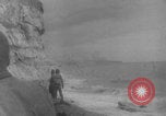 Image of soldiers on Omaha Beach WW2 Normandy France, 1944, second 7 stock footage video 65675079431