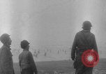 Image of soldiers on Omaha Beach WW2 Normandy France, 1944, second 9 stock footage video 65675079431