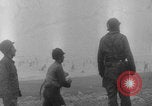 Image of soldiers on Omaha Beach WW2 Normandy France, 1944, second 12 stock footage video 65675079431