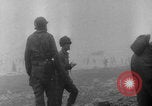 Image of soldiers on Omaha Beach WW2 Normandy France, 1944, second 16 stock footage video 65675079431