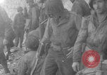 Image of soldiers on Omaha Beach WW2 Normandy France, 1944, second 17 stock footage video 65675079431