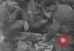 Image of soldiers on Omaha Beach WW2 Normandy France, 1944, second 31 stock footage video 65675079431