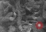 Image of soldiers on Omaha Beach WW2 Normandy France, 1944, second 33 stock footage video 65675079431
