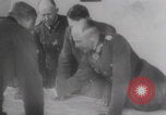 Image of Hitler plans while soldiers fight WW2 Normandy France, 1944, second 3 stock footage video 65675079447