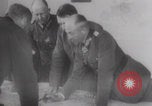 Image of Hitler plans while soldiers fight WW2 Normandy France, 1944, second 4 stock footage video 65675079447