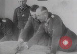 Image of Hitler plans while soldiers fight WW2 Normandy France, 1944, second 7 stock footage video 65675079447