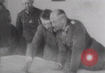 Image of Hitler plans while soldiers fight WW2 Normandy France, 1944, second 8 stock footage video 65675079447