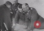 Image of Hitler plans while soldiers fight WW2 Normandy France, 1944, second 9 stock footage video 65675079447