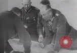 Image of Hitler plans while soldiers fight WW2 Normandy France, 1944, second 11 stock footage video 65675079447