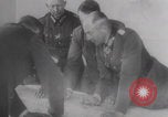 Image of Hitler plans while soldiers fight WW2 Normandy France, 1944, second 12 stock footage video 65675079447