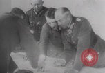 Image of Hitler plans while soldiers fight WW2 Normandy France, 1944, second 13 stock footage video 65675079447
