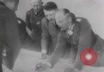 Image of Hitler plans while soldiers fight WW2 Normandy France, 1944, second 14 stock footage video 65675079447