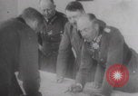 Image of Hitler plans while soldiers fight WW2 Normandy France, 1944, second 16 stock footage video 65675079447