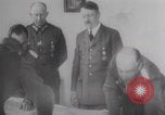 Image of Hitler plans while soldiers fight WW2 Normandy France, 1944, second 18 stock footage video 65675079447