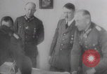 Image of Hitler plans while soldiers fight WW2 Normandy France, 1944, second 19 stock footage video 65675079447
