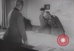 Image of Hitler plans while soldiers fight WW2 Normandy France, 1944, second 20 stock footage video 65675079447