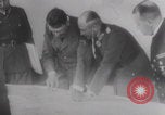Image of Hitler plans while soldiers fight WW2 Normandy France, 1944, second 22 stock footage video 65675079447