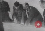 Image of Hitler plans while soldiers fight WW2 Normandy France, 1944, second 23 stock footage video 65675079447