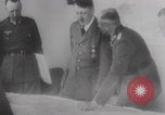 Image of Hitler plans while soldiers fight WW2 Normandy France, 1944, second 25 stock footage video 65675079447