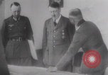 Image of Hitler plans while soldiers fight WW2 Normandy France, 1944, second 26 stock footage video 65675079447