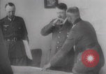 Image of Hitler plans while soldiers fight WW2 Normandy France, 1944, second 27 stock footage video 65675079447