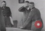 Image of Hitler plans while soldiers fight WW2 Normandy France, 1944, second 28 stock footage video 65675079447