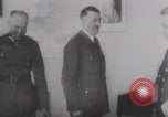 Image of Hitler plans while soldiers fight WW2 Normandy France, 1944, second 34 stock footage video 65675079447