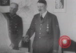 Image of Hitler plans while soldiers fight WW2 Normandy France, 1944, second 39 stock footage video 65675079447