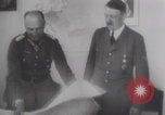 Image of Hitler plans while soldiers fight WW2 Normandy France, 1944, second 41 stock footage video 65675079447