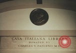 Immagine di Casa Italiana library students reading United States USA, 1957, secondo 18 filmato di repertorio 65675079455