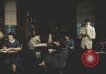Immagine di Casa Italiana library students reading United States USA, 1957, secondo 19 filmato di repertorio 65675079455