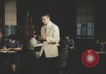 Immagine di Casa Italiana library students reading United States USA, 1957, secondo 21 filmato di repertorio 65675079455