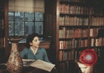 Immagine di Casa Italiana library students reading United States USA, 1957, secondo 24 filmato di repertorio 65675079455