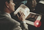 Immagine di Casa Italiana library students reading United States USA, 1957, secondo 33 filmato di repertorio 65675079455