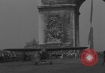 Image of Piper Cub flying Avenue des Champs Elysees Paris France, 1944, second 5 stock footage video 65675079487
