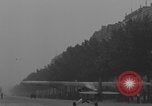 Image of Piper Cub flying Avenue des Champs Elysees Paris France, 1944, second 9 stock footage video 65675079487