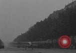 Image of Piper Cub flying Avenue des Champs Elysees Paris France, 1944, second 10 stock footage video 65675079487