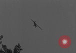 Image of Piper Cub flying Avenue des Champs Elysees Paris France, 1944, second 20 stock footage video 65675079487