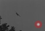 Image of Piper Cub flying Avenue des Champs Elysees Paris France, 1944, second 21 stock footage video 65675079487