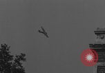 Image of Piper Cub flying Avenue des Champs Elysees Paris France, 1944, second 22 stock footage video 65675079487