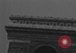 Image of Piper Cub flying Avenue des Champs Elysees Paris France, 1944, second 24 stock footage video 65675079487