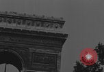 Image of Piper Cub flying Avenue des Champs Elysees Paris France, 1944, second 26 stock footage video 65675079487