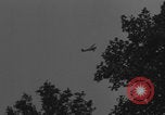 Image of Piper Cub flying Avenue des Champs Elysees Paris France, 1944, second 28 stock footage video 65675079487