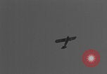 Image of Piper Cub flying Avenue des Champs Elysees Paris France, 1944, second 32 stock footage video 65675079487