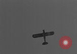 Image of Piper Cub flying Avenue des Champs Elysees Paris France, 1944, second 34 stock footage video 65675079487